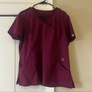 Cherokee Infinity Women’s V Neck Four Pocket Scrub Top in Color Wine XL.